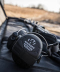 Rechargeable Lightweight Shooting Range Electronic Hearing Protection Earmuffs With FireMax Slim Low Profile Design on outdoor surface