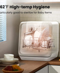 Slick Countertop Dishwasher With Built In Six Liter Water Tank, Portable Mini Cleaning Station Featuring Seven Custom Wash Cycles Uv Sanitization, Auto Open Dry Door And No Sweat Setup For Dorms, Rvs Or Tiny Kitchens, White showing high-temp hygiene and sterilizing capability for baby items.