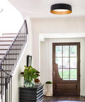 Matte Black Flush Mount Ceiling Light With Gold Interior 12.5 Inch LED Fixture 18W in a modern hallway setting