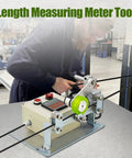 Hella Accurate Digital Wire Cable Length Meter With Easy Roll Counter Wheel For Fishing Line Braided Cords And Power Wires showing use in a workshop.