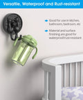 Double Cat Suction Cup Hooks 4 Pack Heavy Duty Wall Holders With Rock Solid Vacuum Grip For Bathroom Shower Towels Coats Waterproof Matte Silver, holding a green sippy cup.