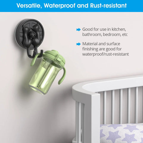 Double Cat Suction Cup Hooks 4 Pack Heavy Duty Wall Holders With Rock Solid Vacuum Grip For Bathroom Shower Towels Coats Waterproof Matte Silver, holding a green sippy cup.