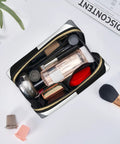 Hella Cool Black And White Piano Plate Grid Print Portable Makeup Bag For Women Offering Tough Waterproof PVC Finish Travel Toiletry Organizer And Brush Holder with cosmetics inside.