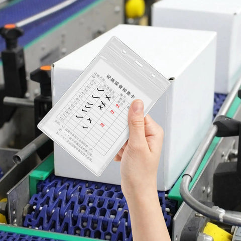 Person holding Pro Grade 20 Pack Industrial Equipment Inspection Card Set With Sleeves, Cable Ties, And Blank Maintenance Log Space