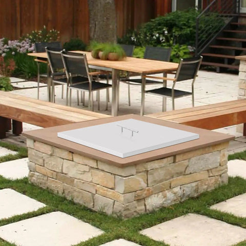 Stainless Steel Fire Pit Cover For 21 And 27 Inch Round Pits With Handle on stone outdoor fire pit in patio setting.