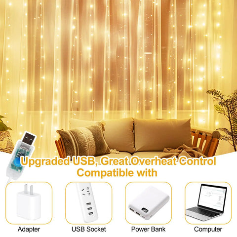 300 LED Fairy Curtain Lights 9.8 X 9.8 Ft USB Plug In With 8 Modes Remote Warm White glowing behind couch.