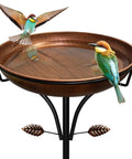 Vintage Outdoor Metal Bird Bath With Free Standing Stake And Detachable Feeder Bowl In Antique Bronze Finish, birds resting on it.