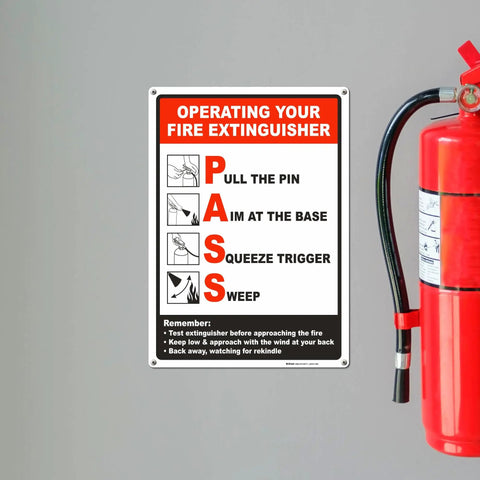 10 By 14 Inch Fire Extinguisher Sign Made From Durable Polyethylene Plastic With Bold Text And Symbol Clear Operating Instructions For Easy Fire Safety And Quick Wall Mount Install next to fire extinguisher.