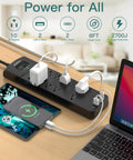 Surge Protector Power Strip With 10 Outlets And 4 USB Ports 2 USB C Six Foot Heavy Duty Extension Cord Flat Plug 2700 Joules Of Surge Protection Overload Protection Ideal For Home Office Setup And Busy Workspaces Boss Level Convenience in use on a desk with charging devices.
