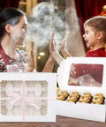 Six Pack Cupcake Boxes That Hold 12 Standard Cupcakes With Clear Windows Food Safe Paper Bakery Carriers on a table