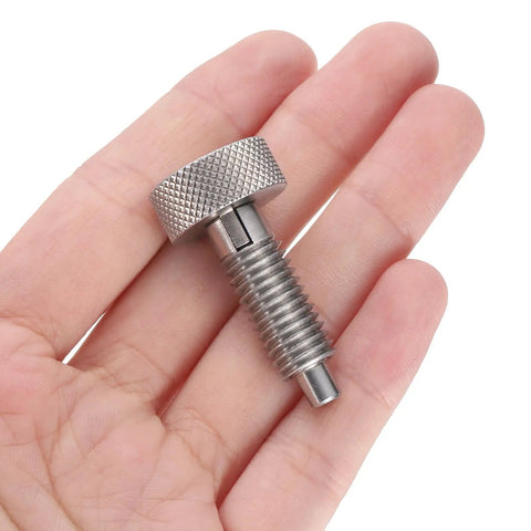 Heavy Duty Spring Plunger Pins In A Two Piece Kit With Knurled Grips And M10x1.5 Threads, shown in hand for scale.