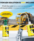Portable Eye Wash Station Wall Mounted OSHA Approved Emergency Eye Wash Kit With Upgraded Bottle Holder And Larger Mirror Plus Sixteen Point Nine Ounce Bottles No Solution Included Green Cap Ready For Any Spill, 16.09oz empty eyewash bottle shown next to a sink faucet.