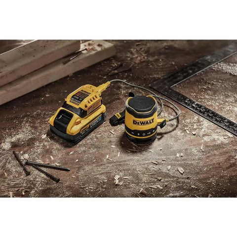 Rugged Jobsite Bluetooth Speaker With USB C Rechargeable Battery IP67 Dust And Water Resistant on workbench