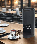 58Mm Led Display Electric Espresso Tamper Nailing Perfect Pressure And Spot On Depth Control Pulling Sick Shots Daily Top Shelf Barista Grade Coffee Press Tool For Pros on a cafe table with coffee beans.