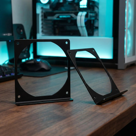 Two Pack Rock Solid Iron Computer Fan Bracket Set For 12cm PC Fans No Fuss Easy Install CPU Cooler Mount For PC Chassis Replaces Damaged Frames Boosts Airflow And Ensures Secure Mounting For Electronics Cooling, black metal brackets on desk