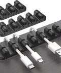 Upgraded Silicone Cable Clips Holder Self Adhesive Cord Management Organizer 3 Slot Black on desktop with cables
