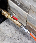RV Winterize Blowout Adapter with valve brass construction connecting to a wall fitting, showing 1/4 inch quick connect and 3/4 inch garden hose threading.
