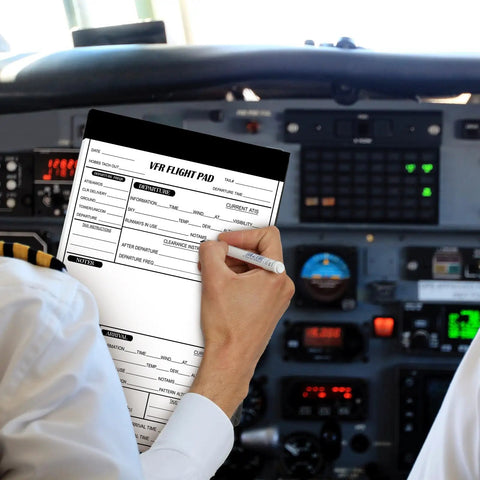 Pilot using 6 Pack VFR Pilot Kneeboard Notepad Pads, 50 Pages Each, Pre Printed Flight Planning Pages in aircraft cockpit
