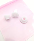 Three white gears from Five Set Change Tractor Idle Gear Kit For OKI Okidata ML320 ML321 ML390 ML391 ML420 ML421 ML490 ML491 ML520 ML521 ML590 ML591 Printers OEM Codes 51215901 51228001 51228101 51238501 on pink background