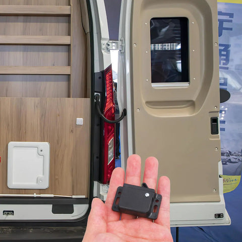 Rugged RV Cabinet Latches With Drawer Grabber Locks For Camper And Travel Trailer In Motion, black ABS latch in hand beside RV door