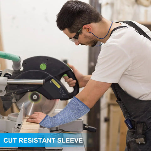 Level 5 Cut Resistant Arm Sleeves With Thumb Hole, Tough As Nails HPPE Forearm Guards For Kitchen And Workshop, Real Deal Slash Shield For Sensitive Skin, 1 Pair Blue Small, worn by a worker using a miter saw.