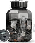 Extra Large Piggy Bank For All US Coins With LCD Digital Counter, 2.4L Capacity Coin Counter Jar holding US coins and displaying total.