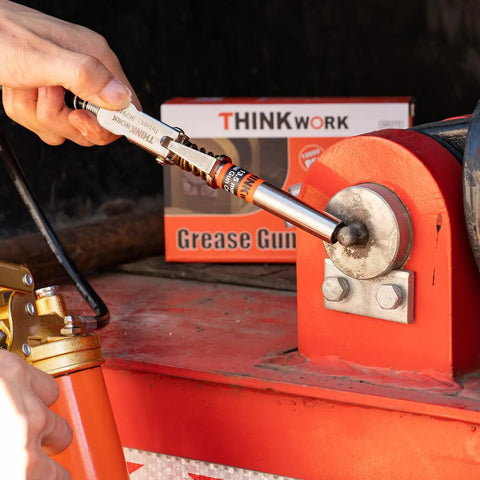 Ultra Slim 0.53 Inch Grease Gun Coupler Set, 2 Piece Quick Release Tips With Over 3.5 Inch Reach, installed on machinery