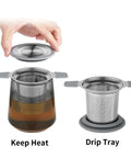 Stainless Steel Loose Leaf Tea Infuser With Extra Fine Mesh Ball Heat Proof Dual Handle Steeper shown with lid and drip tray