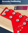 Close-up of red Two In One Cabinet Hardware Jig That Doubles As A Shelf Pin Drilling Guide With All Metal Self Contained Clamps