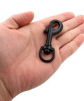 Built Tough Swivel Bolt Snap Hooks With D Ring Ends Rock Solid Lobster Claw Trigger Clips For Handbags Purses Knitting And Leatherwork Matte Black in a hand.