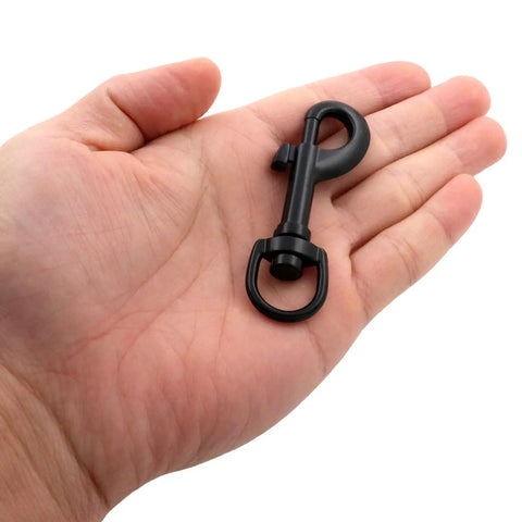 Built Tough Swivel Bolt Snap Hooks With D Ring Ends Rock Solid Lobster Claw Trigger Clips For Handbags Purses Knitting And Leatherwork Matte Black in a hand.