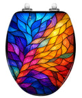 Elongated Colorful Stained Glass Effect Abstract Leaf Radiant Toilet Seat with vibrant leaf-patterned design.