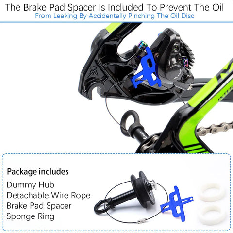 5 In 1 Dummy Hub Bicycle Tool Kit with brake pad spacer and wire rope for 12mm through axle maintenance shown in bike frame