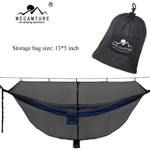 No-See-Um Hammock Mosquito Net XL 11FT By 4.6FT With 360 Degree Bug Protection Polyester Mesh Dual Sided Diagonal Zipper For Easy Access Fits All Hammocks For Camping displayed with storage bag