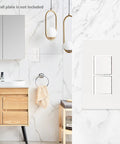 Two In One Duplex Rocker Combination Switch 4 Pack 15A 120V Decorator Double Light Switch Space Saving Stack Switch For Fan And Light Control UL Listed White Finish installed on a bathroom wall.
