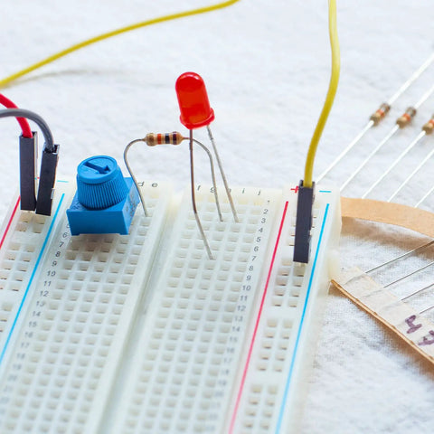 Blue 12 Pack 10K Trim Potentiometer Kit With Knobs For Breadboards And Prototyping Variable Resistors Trimmer Potentiometers Assortment For Arduino Projects on breadboard with LED