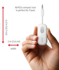 Hand holding Wireless Bluetooth Audio Transmitter For AirPods And Headphones With 20 Plus Hour Battery, 3.5mm Aux Jack.