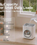 Slim Portable Mini Washer That Crushes Small Loads Without The Hassle A Real Game Changer For Dorm Life And Weekend Trips With Snappy USB C Charge pouring water into 2L capacity washer on countertop.