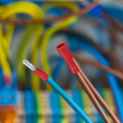 Close-up of 200 Pcs Bullet Connectors Set Male And Female 22 16AWG Insulated Splice Terminals for electrical wiring.