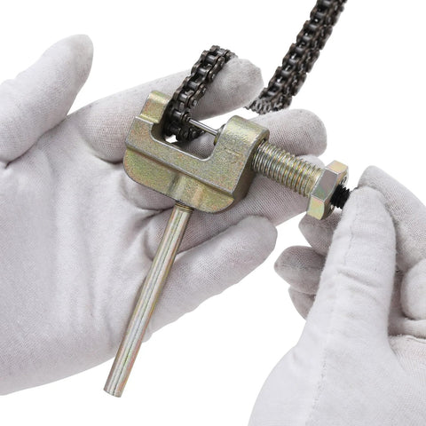 KAMIER roller chain breaker tool, zinc-plated steel, with threaded bolt, shown in close-up with a chain.