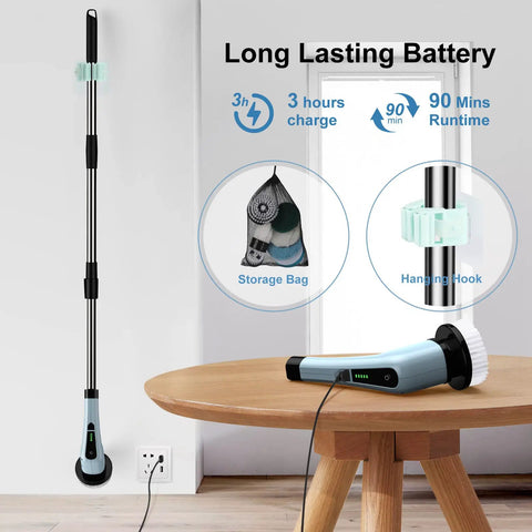 Cordless Spin Scrubber With Adjustable Extension Handle displayed with charging cable and accessories on wooden table.