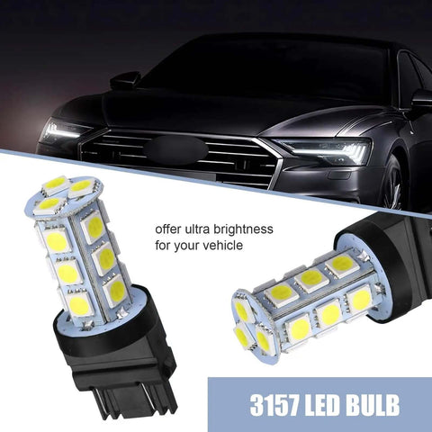 Lit 10 Pack 3156 3157 LED Tail Lights With 18 SMD Chips 6500K White DC12V bulbs next to a car