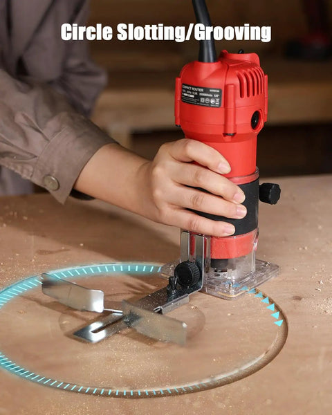 Using Beefy 630W Wood Router Tool With Fixed Base for circle slotting on wooden surface, showing compact design in action.