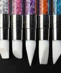 Close-up of 5 Piece Nail Art Sculpture Pen Set Dual Tip Silicone Tools for 3D design with silver handle and colorful crystals.