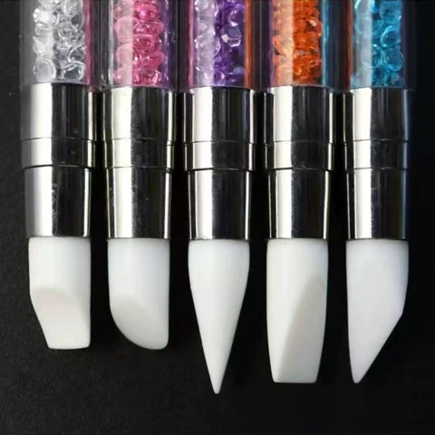 Close-up of 5 Piece Nail Art Sculpture Pen Set Dual Tip Silicone Tools for 3D design with silver handle and colorful crystals.