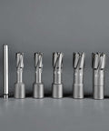 Front view of eight-piece carbide annular cutter set with Weldon shanks and two pilot pins