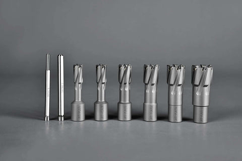 Front view of eight-piece carbide annular cutter set with Weldon shanks and two pilot pins