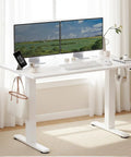 Seang Electric Height Adjustable Standing Desk 48 By 24 Inch Sit Stand Workstation with dual monitors and cable management.