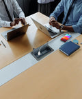 Conference table with Table Power Multimedia Connectivity Box For Conference Rooms With 2 Outlets, RJ45 Ethernet, USB 3.0, HDMI, VGA, and 3.5mm Audio, Easy Install In Black Brushed Metal With Slow Close Lid, Upgraded USB 3.0 For Faster Data Transfer visible with open slow-close lid