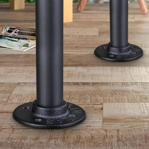 Close-up of industrial pipe legs with flanges for DIY tables, part of 4 Pack Industrial Pipe Table Leg Set For DIY Rustic Farmhouse Tables And Furniture, Heavy Duty Metal Pipes With Flanges, Vintage Style Desk Leg Support, 12 Inch, Anti Rust Coating For Easy Assembly.